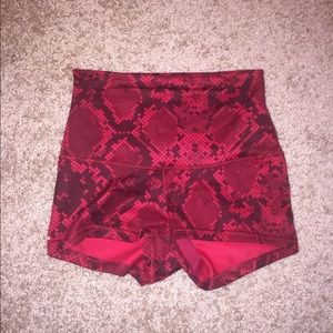 LULULEMON red snake-patterned booty shorts